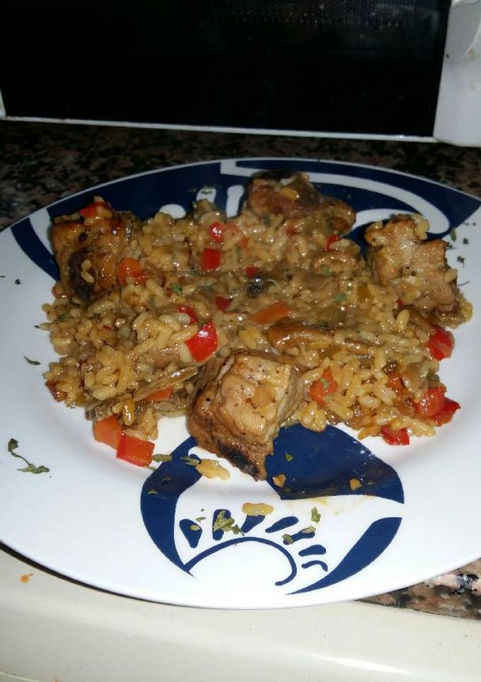 Una foto de Arroz con costillas y ceps