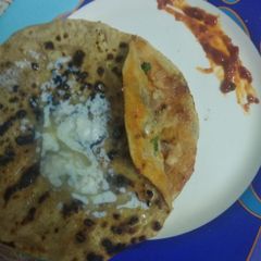 Schezwan Aloo Parantha A picture of Schezwan Aloo Parantha.