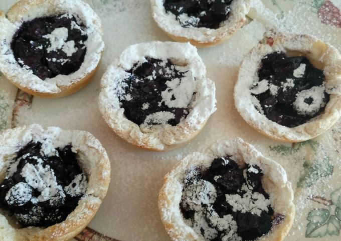 Apple and blueberry bread and butter tarts