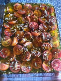 Una foto de Tomatitos cherry confitados