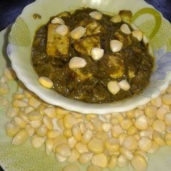 A picture of Corn palak paneer.
