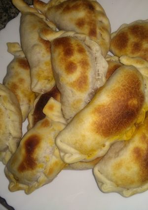 A picture of Pork Thigh Empanadas 😋😋 Chopped by Hand.