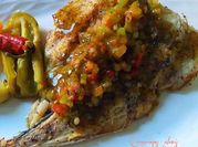 Una foto de pescado a la vinagreta