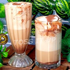 A picture of Iced Cold Coffee With Chocolate Sauce And Vanilla Icecream.