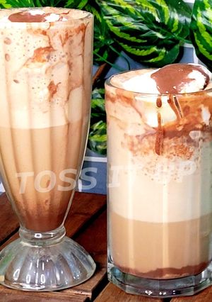 A picture of Iced Cold Coffee With Chocolate Sauce And Vanilla Icecream.
