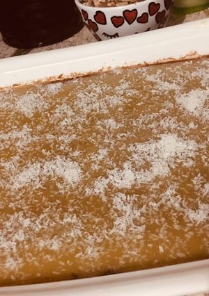 Una foto de Flan de chocolate bañado con coco condensado y coco rallado 😋 (fácil, simple y rico) 💚