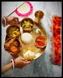 Bengali thali mutton kosa with plain rice, vegetable curry,alu posto,rasogolla and chutney