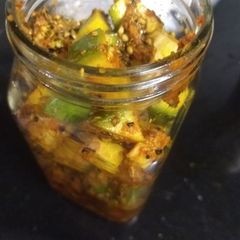 A picture of Raw mango pickle.