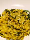 Risotto con agretti, curcuma e scorza di limone