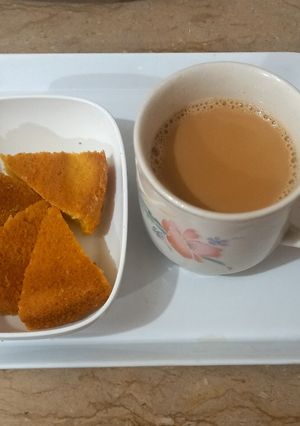 A picture of Tea with honey 🍯.
