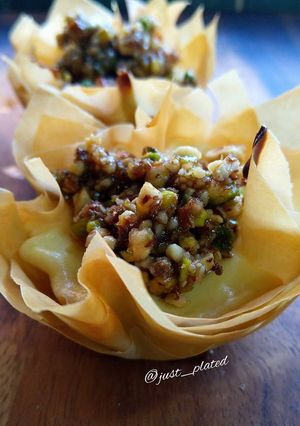 A picture of Baklava Cheesecake Tarts.