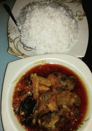 A picture of White rice and local stew.