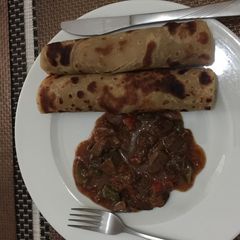 A picture of Liver and chapati.
