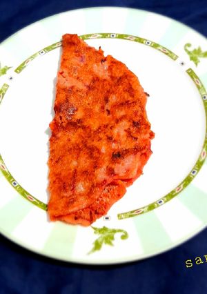 A picture of Carrot and Beetroot Rava Dosa.