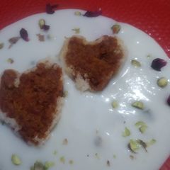 A picture of Instant rasmalai filling with gajar halwa.