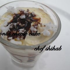 A picture of Coconut cheese cake in shot glass.