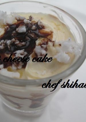 A picture of Coconut cheese cake in shot glass.