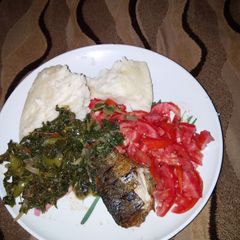 Ugali, Spinach and smoked fish A picture of Ugali, Spinach and smoked fish.