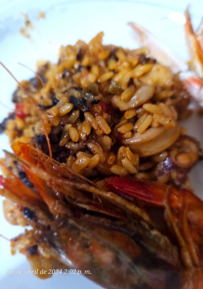 Una foto de Arroz y frutos de mar
