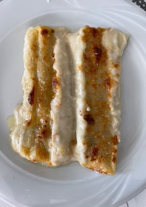 Una foto de Canelones XL de carrillada y boletus
