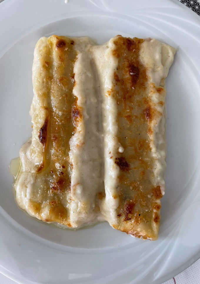 Una foto de Canelones XL de carrillada y boletus