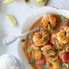 A picture of Goan prawn curry with raw mango.