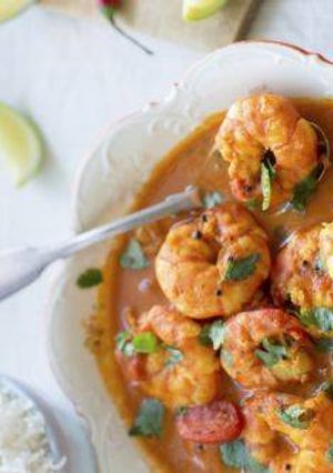 A picture of Goan prawn curry with raw mango.