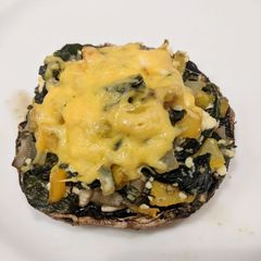 A picture of Stuffed Spinach & Feta Mushrooms.