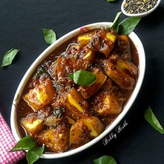 A picture of Amba Khatta (traditional odia style instant raw mango pickle).