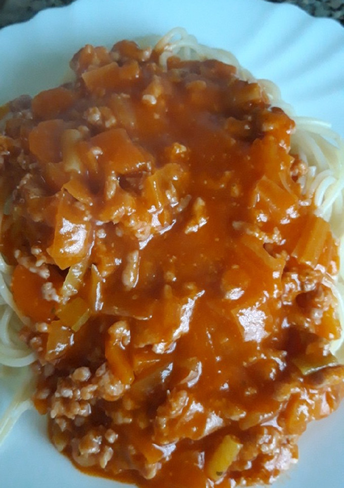 Una foto de Carne a la bologñesa con espaguetis