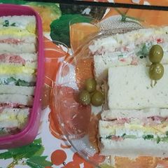 A picture of Three layered / three coloured sandwiches.
