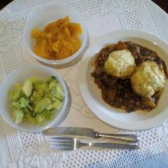 A picture of Beef Stew with Dumplings.