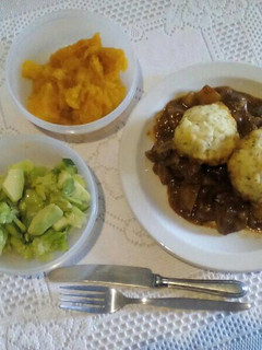 A picture of Beef Stew with Dumplings.