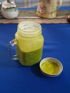 A picture of Frozen banana, raw oats, almond milk, and moringa smoothie.