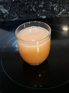 Una foto de Zumo de granada y naranja
