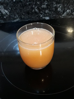 Una foto de Zumo de granada y naranja