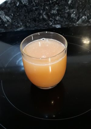 Una foto de Zumo de granada y naranja
