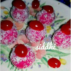 A picture of Starwberry coconut laddu.