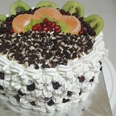 A picture of Mixed fruit and chocolate chips cake.