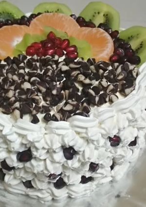 A picture of Mixed fruit and chocolate chips cake.