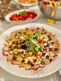 Octopus Carpaccio in extra virgin oil oil and paprika powder