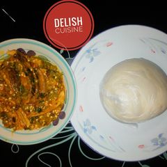 A picture of Okro soup with cassava swallow.