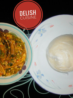 A picture of Okro soup with cassava swallow.