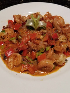 A picture of Shrimp & Grit Cakes (Kentucky Bourbon Butter Sauce).