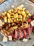 Tagliata de bœuf à l’huile de truffe