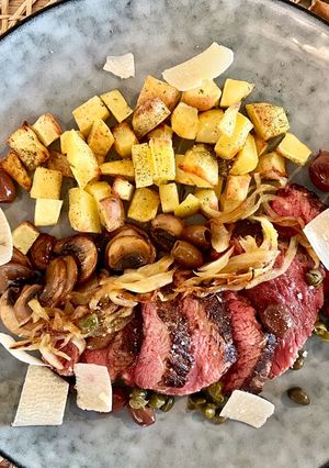 Une photo de Tagliata de bœuf à l’huile de truffe