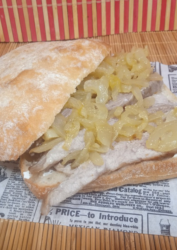 Una foto de Bocadillo de secreto con queso Philadelphia y cebolla