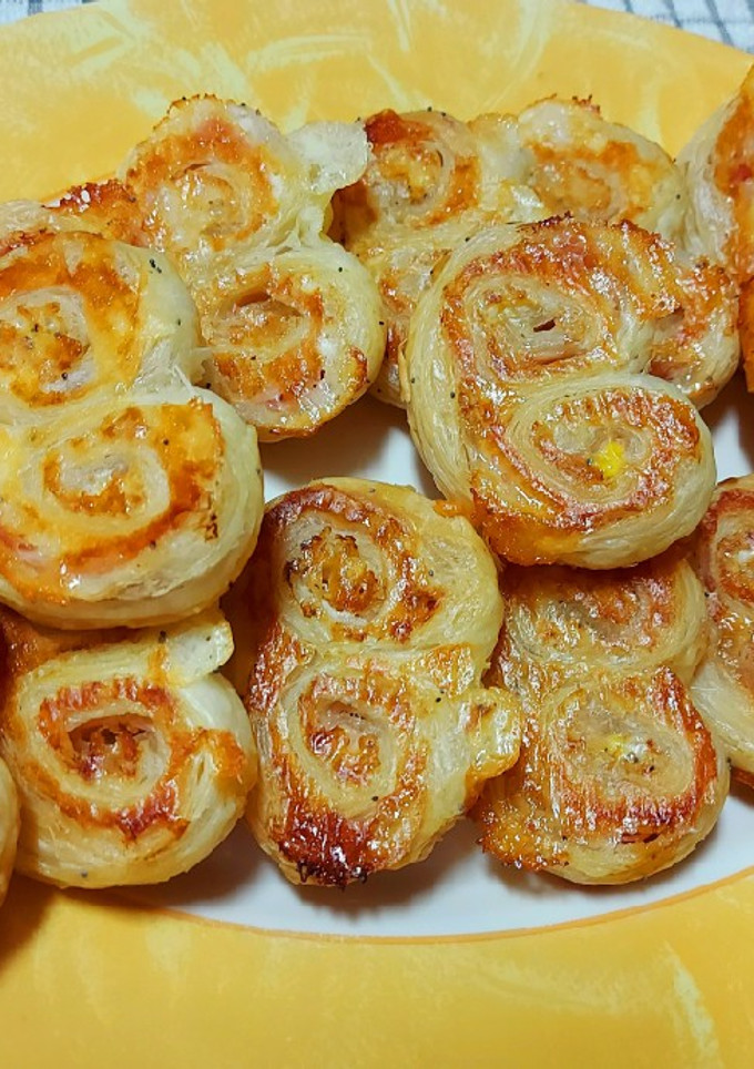 Una foto de Palmeritas de hojaldre con queso y jamón