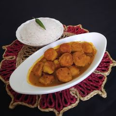 A picture of Bengal Gram Dal Fritters Curry.