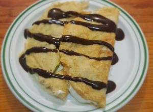 Una foto de Crepas dulces de avena con kiwi y chocolate